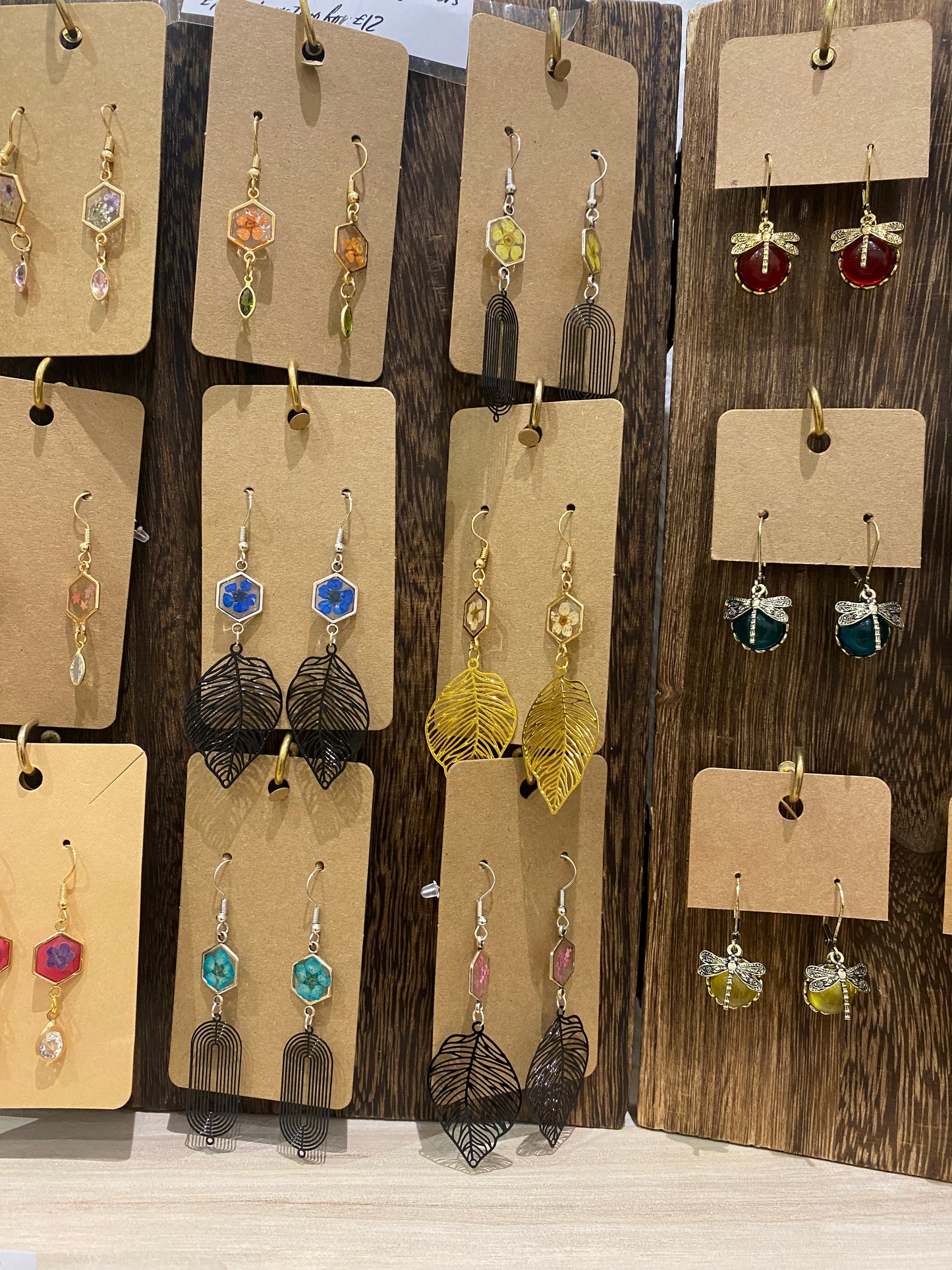 Earrings with tails , leaf or bar