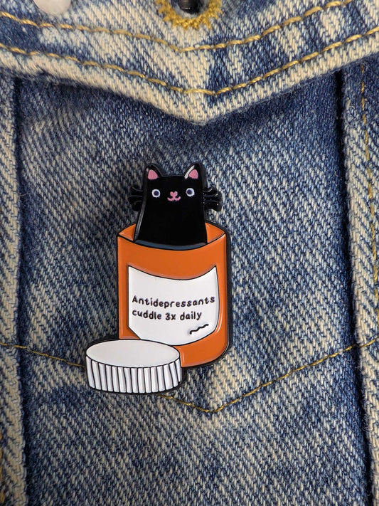 Anti-depressant cat enamel pin