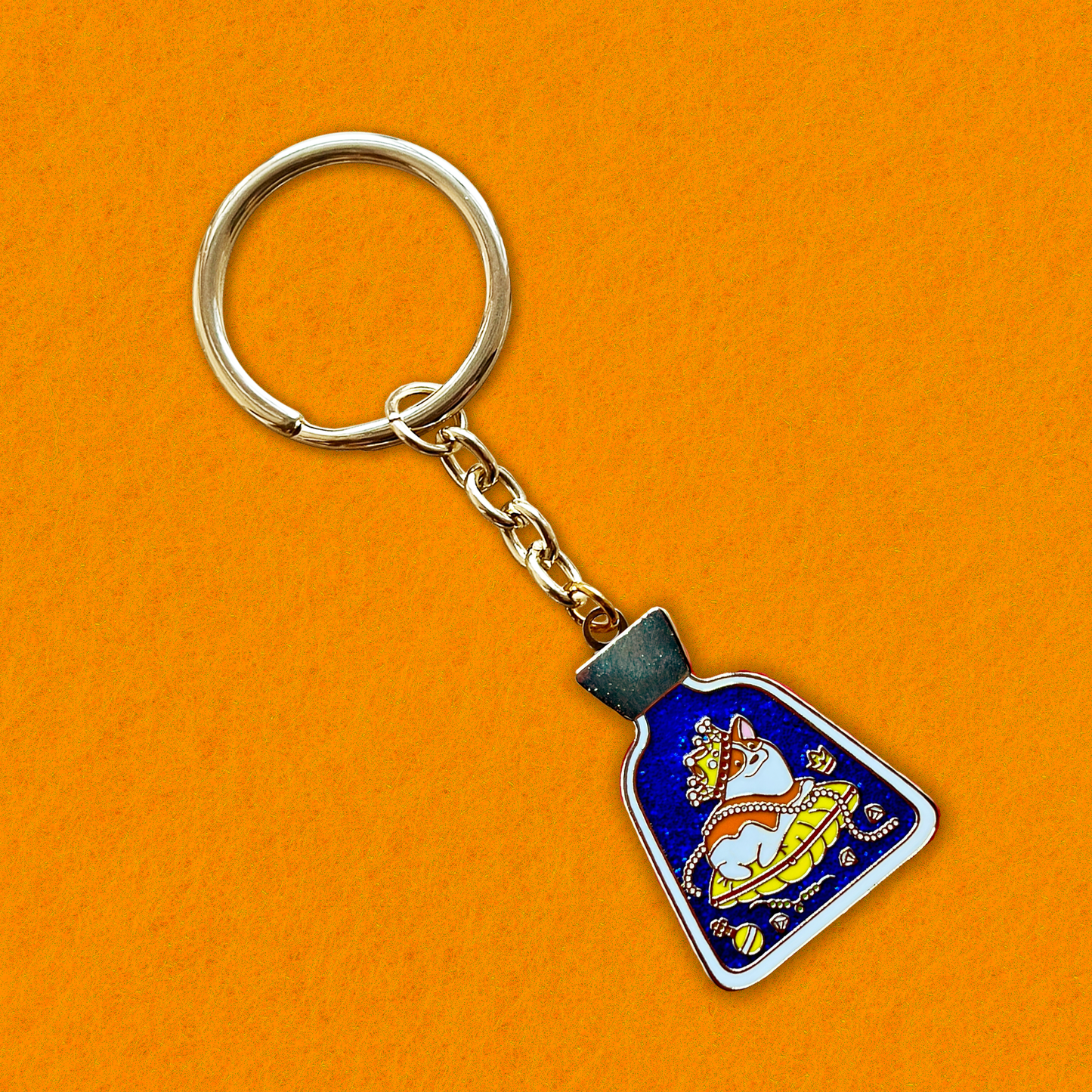 Foxti illustrated keyring with gold-plated chain on premium recycled card packaging