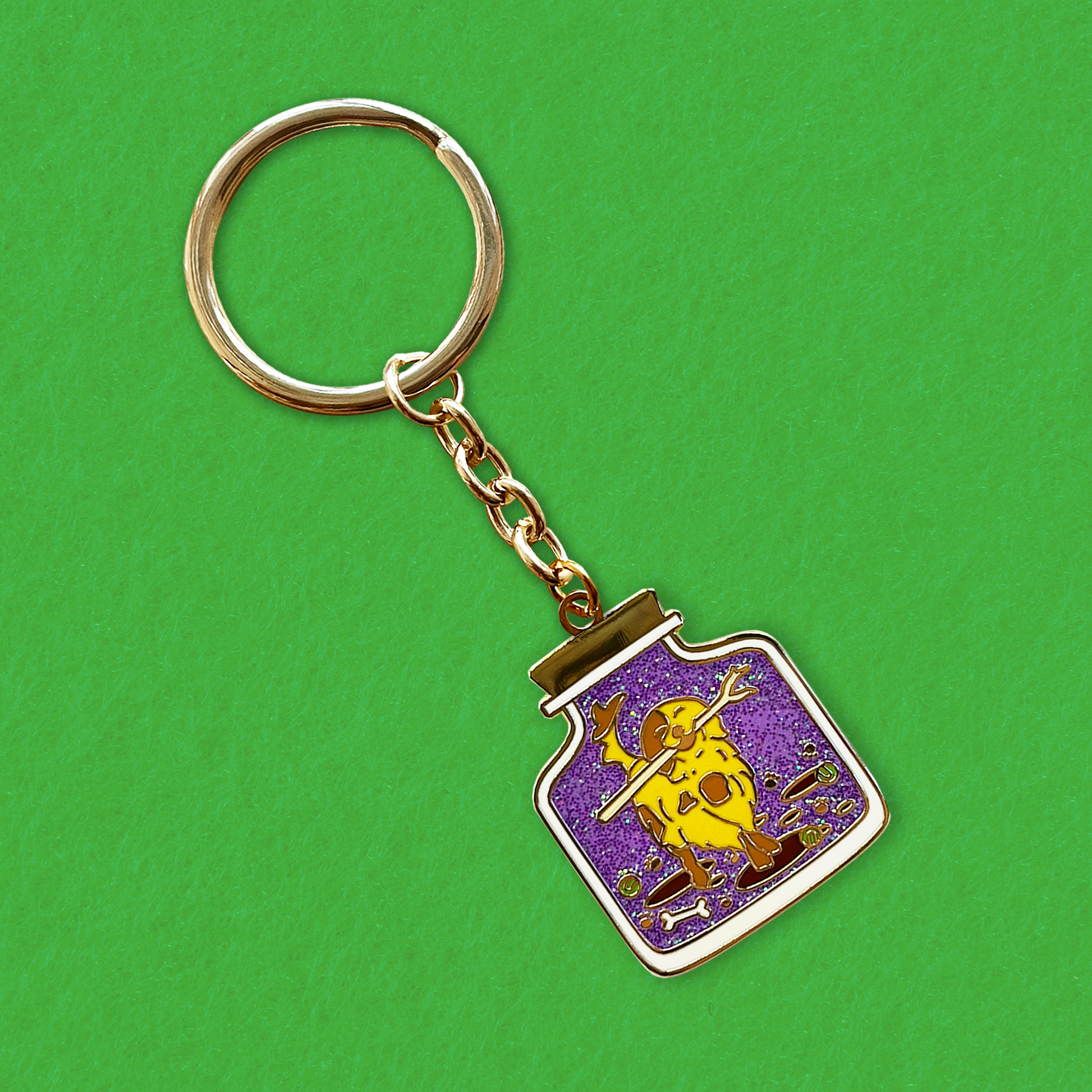 Foxti illustrated keyring with gold-plated chain on premium recycled card packaging