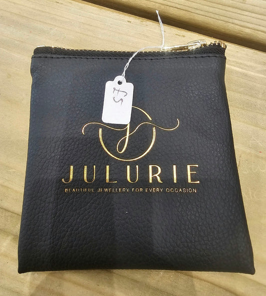 Julurie black textured leather jewellery wallet with gold detailing and zip closure