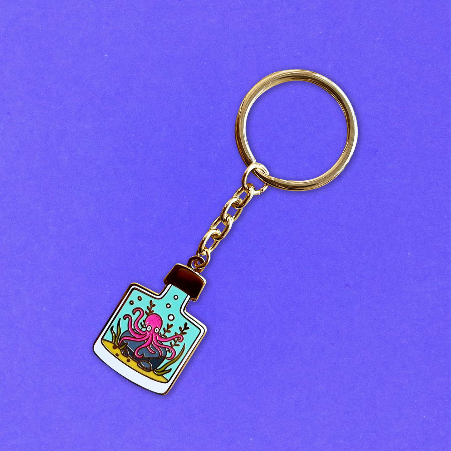 Foxti illustrated keyring with gold-plated chain on premium recycled card packaging