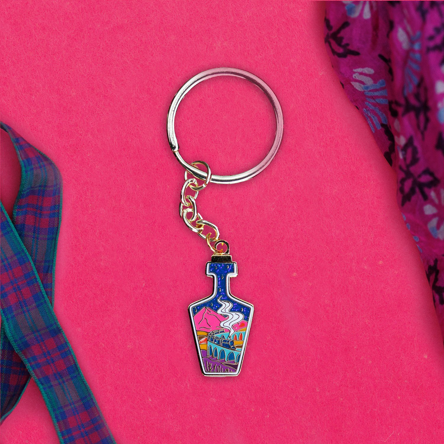 Foxti illustrated keyring with gold-plated chain on premium recycled card packaging