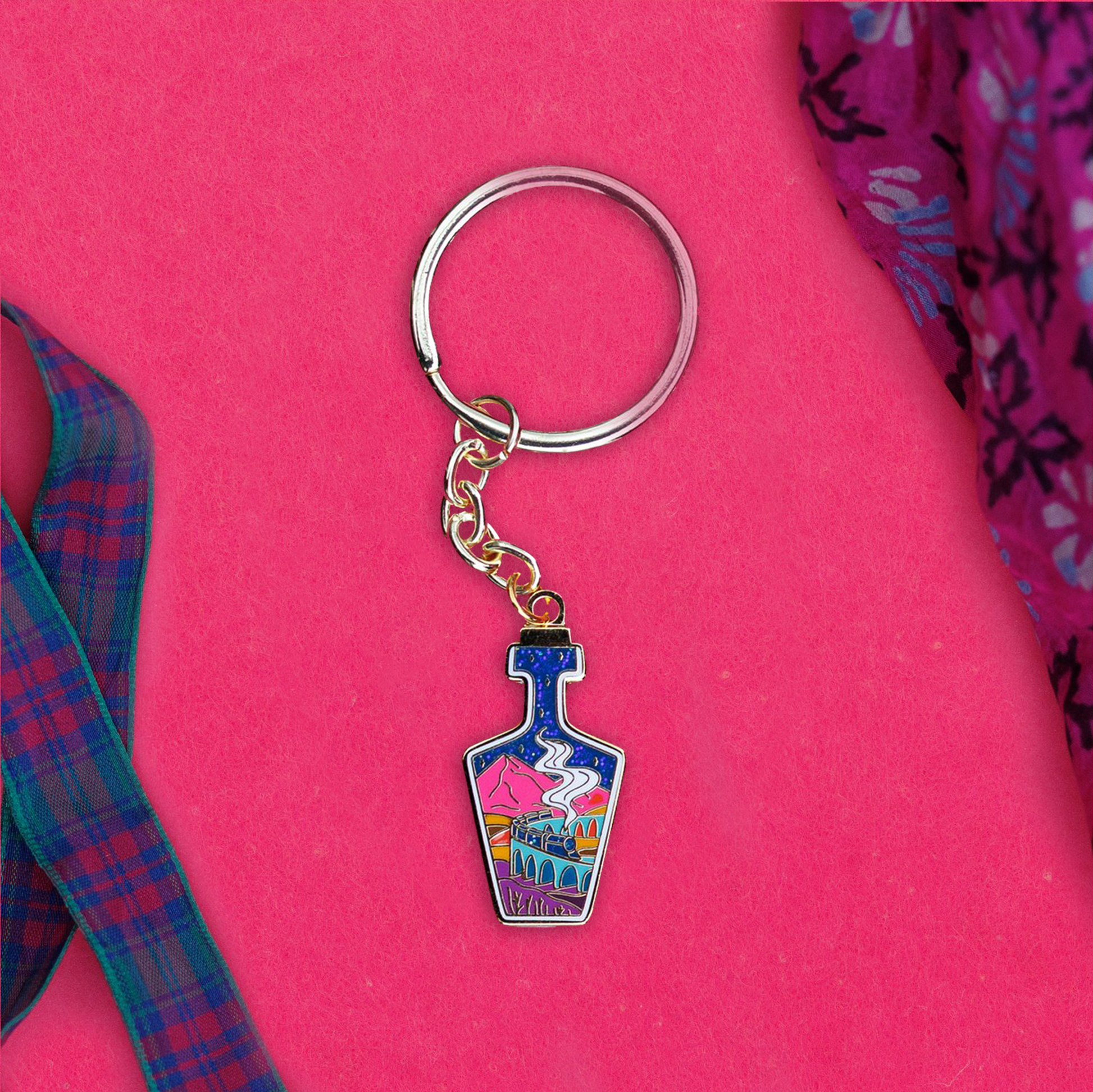 Foxti illustrated keyring with gold-plated chain on premium recycled card packaging