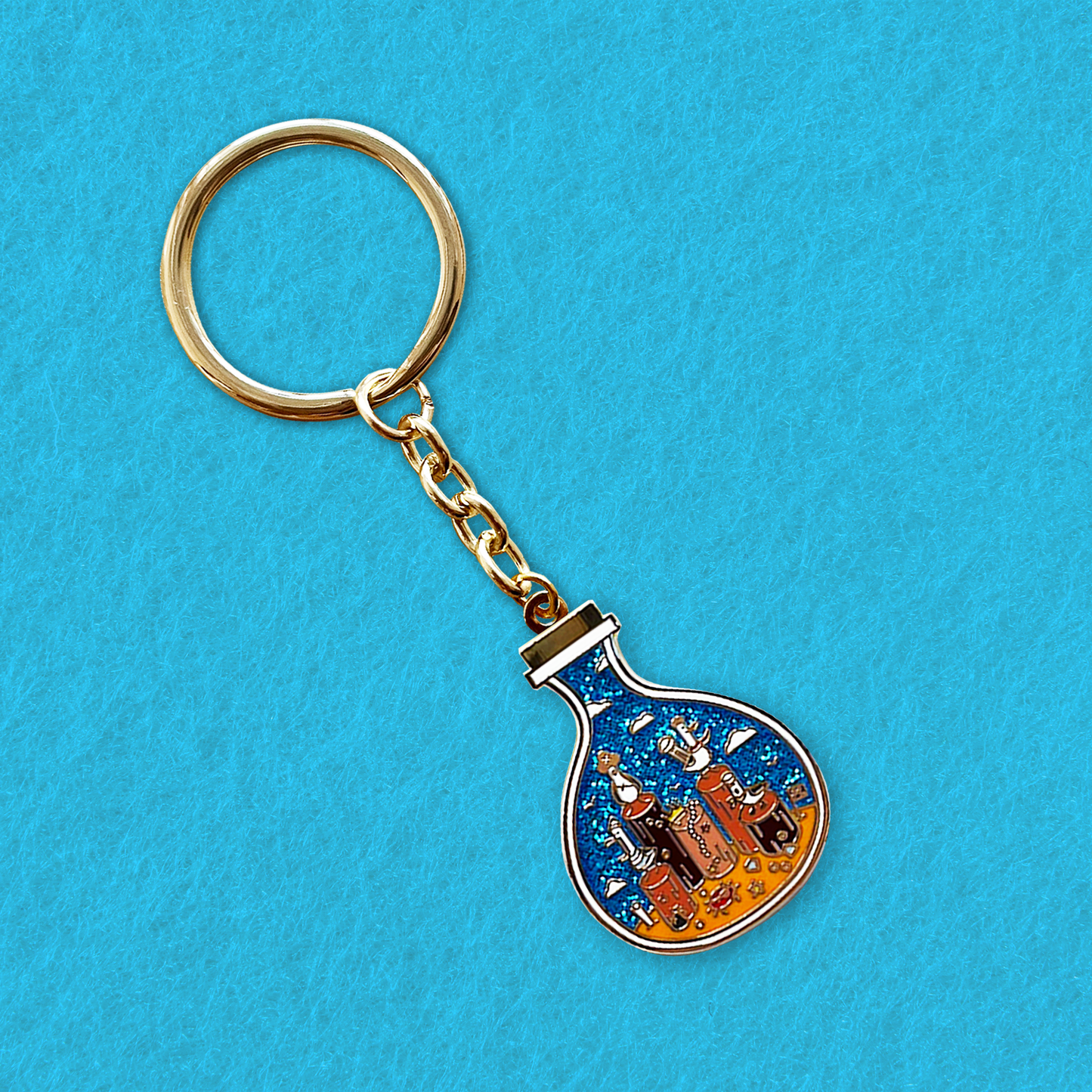 Foxti illustrated keyring with gold-plated chain on premium recycled card packaging