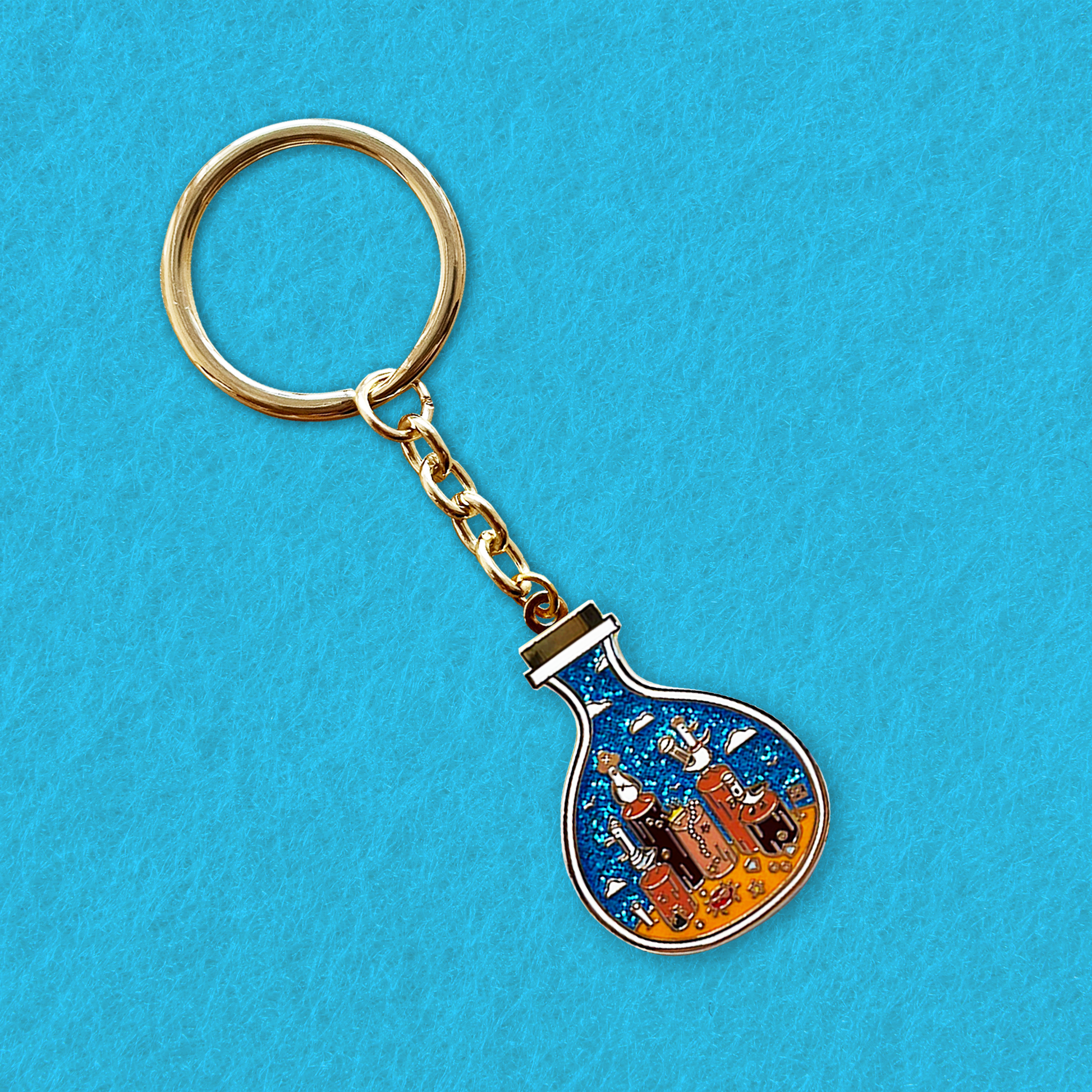 Foxti illustrated keyring with gold-plated chain on premium recycled card packaging