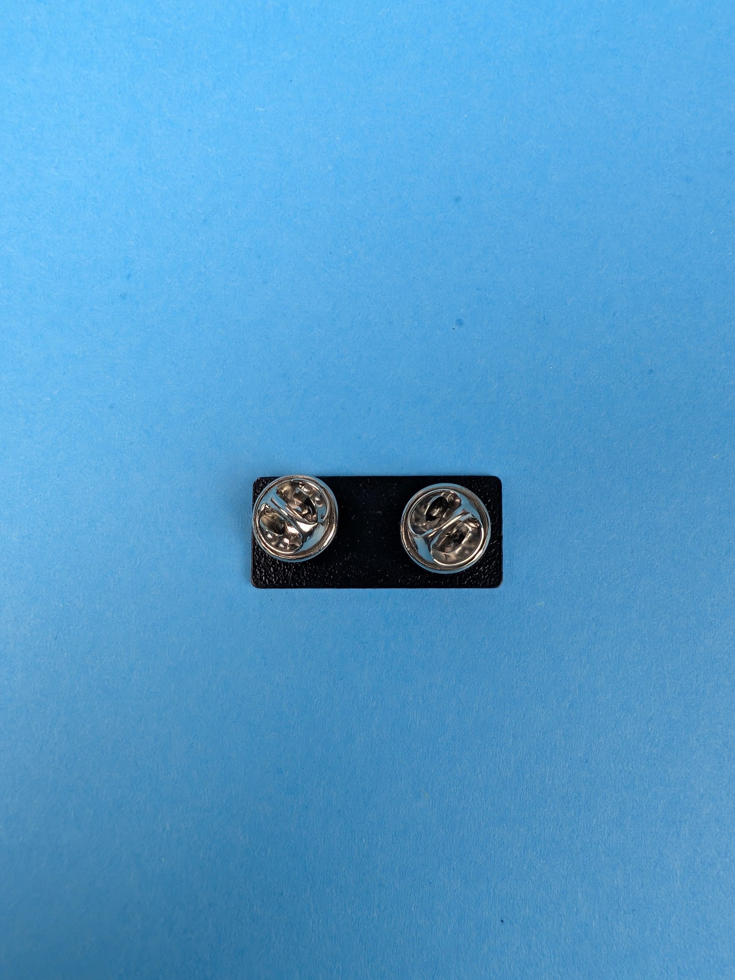 Busy doing a sidequest enamel pin