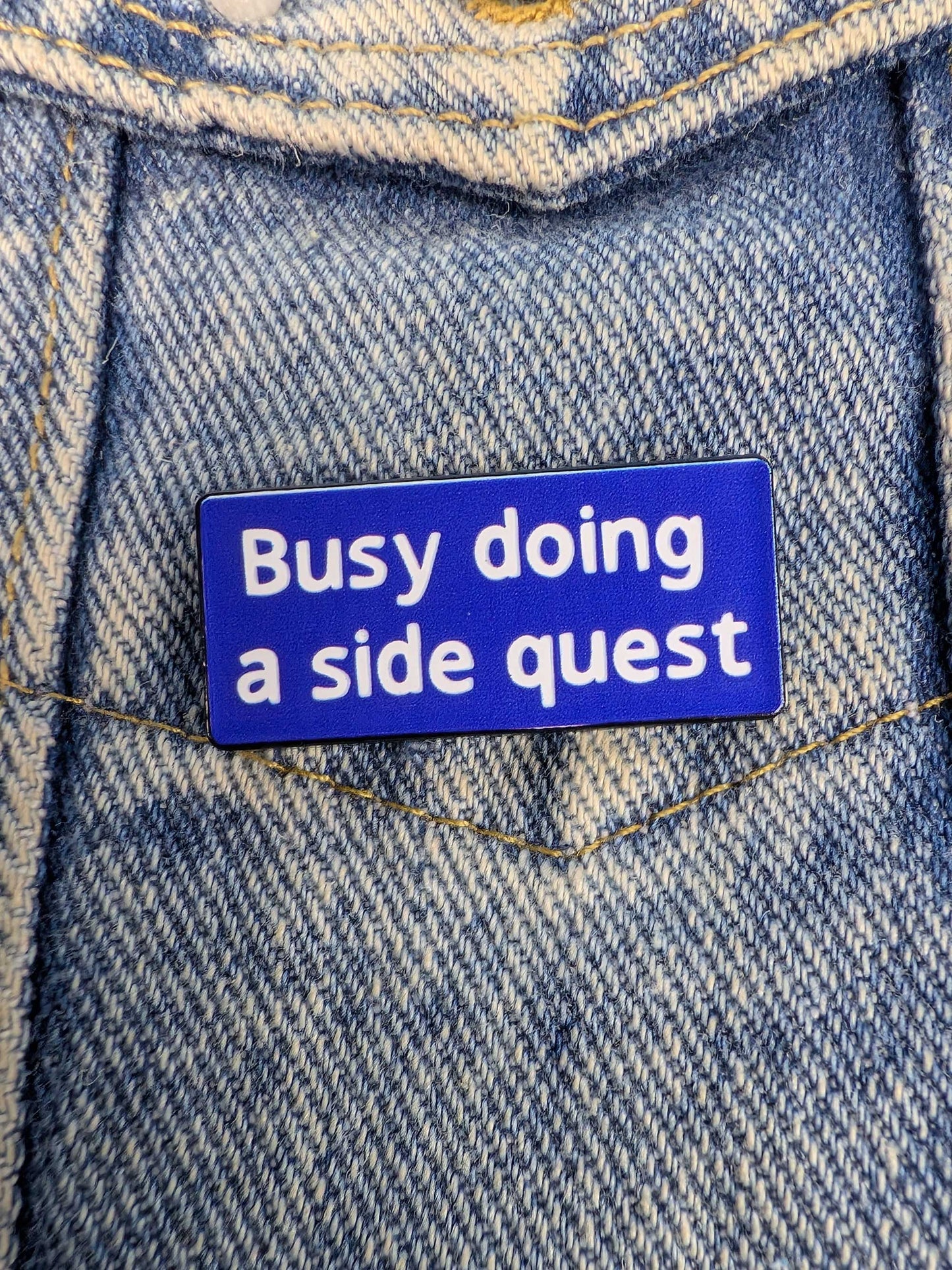 Busy doing a sidequest enamel pin